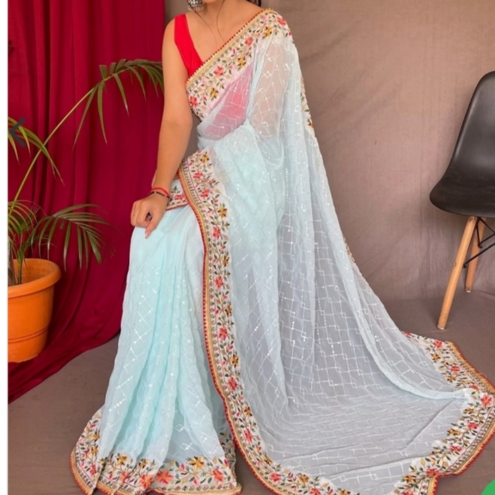 Elegant Light Blue Saree with Red Blouse